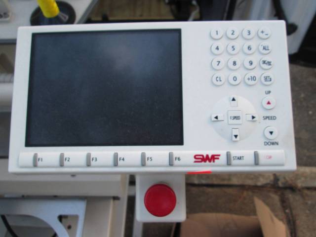 swf 15 needle embroidery machine bearly used