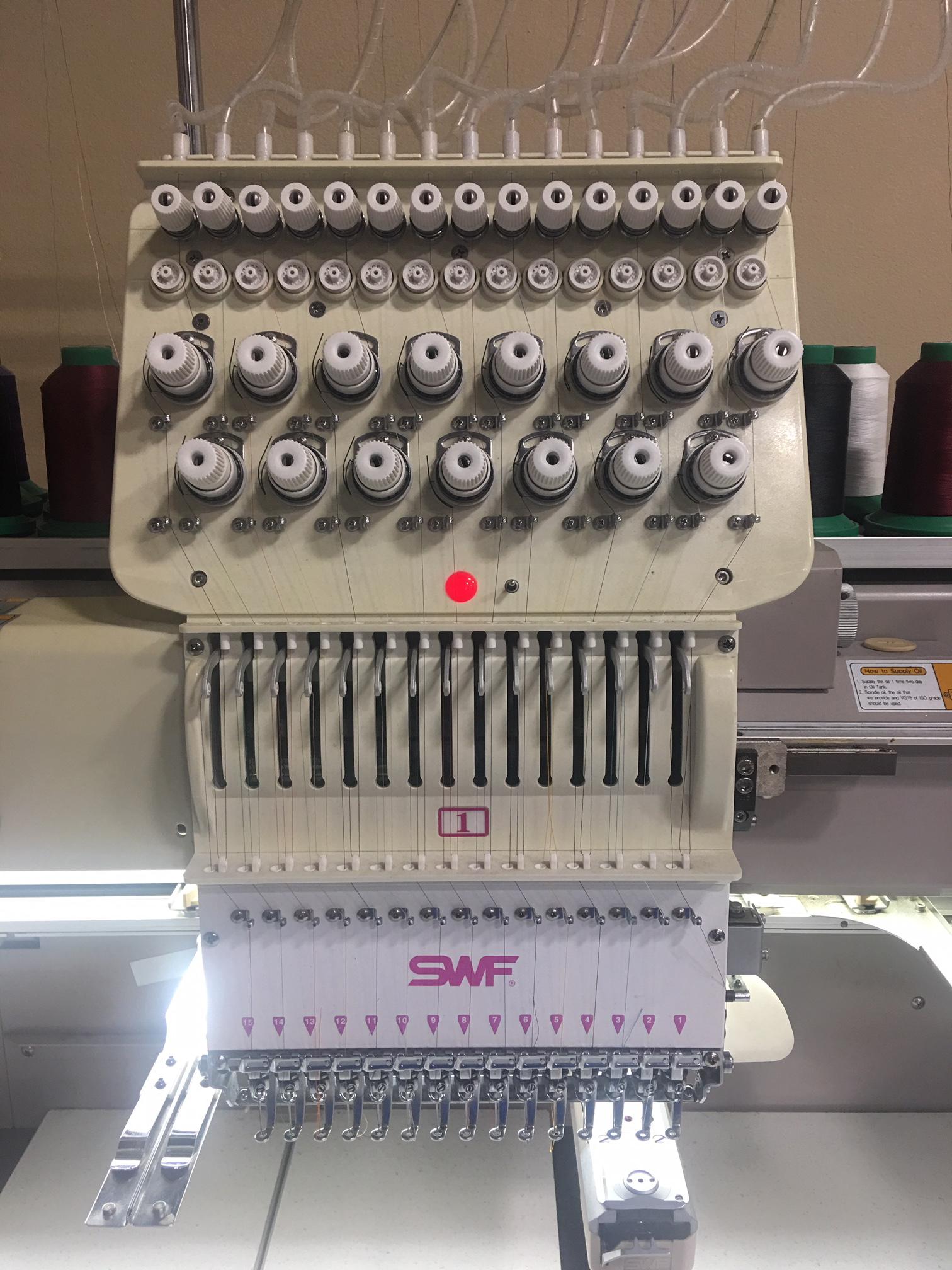 swf 15 needle embroidery machine barely used with hoops