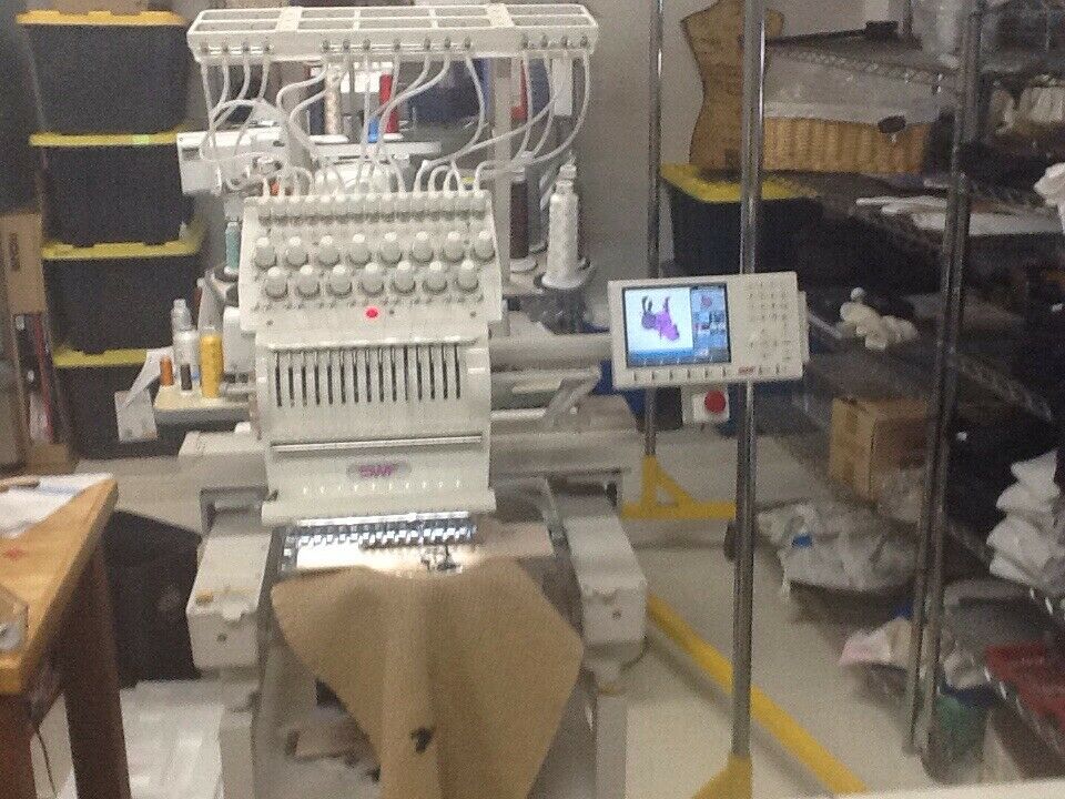 (2) used SWF commercial embroidery machines